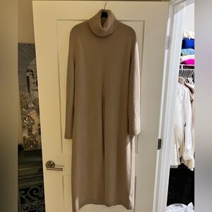 100% wool
Tan long duster sweater w/front slit.
Sold out Pixie Market
One size